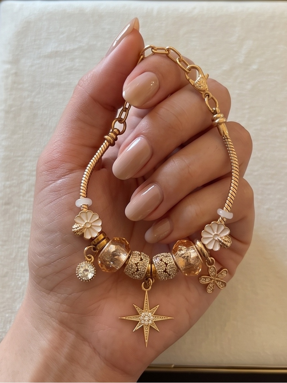 Gold Celestial Starburst Charm Bracelet with Champagne Crystal Beads